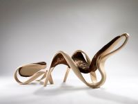 Enignum Lounge Chair.one of a kind piece.olive ash, copper, silk, woven textile.2011