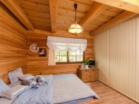 ložnice ve srubu roubence