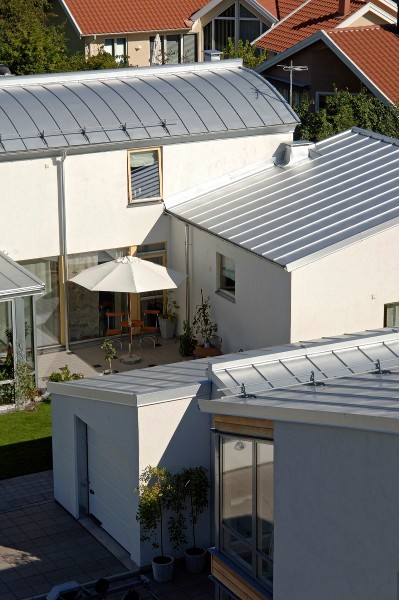 plechové střechy domů