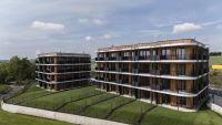 Rezidenční projekt Timber Praha v areálu Arcus City je hotový
